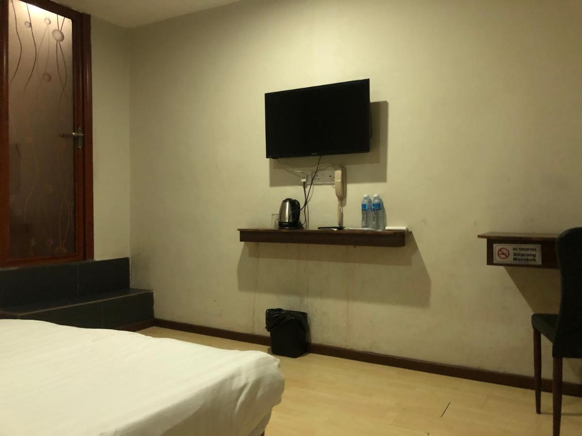 Super Oyo 90668 Joy Inn Miri Exterior foto